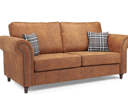 Oakmont 3 seater Sofa  - Tan,  faux leather three seater sofa is soft-to-the-touch and cosy, rounded arms with button detail and  metal studded up the front of the arm.