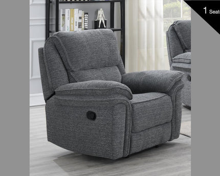 Belmont Manual Recliner armchair. in a soft touch fabric in a dark grey colour. Contrast stitch piping in a light grey colour adds a touch of luxury to the suite. 