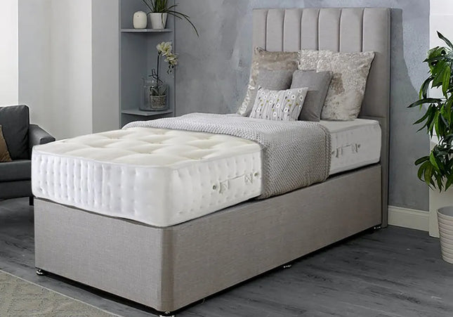 A single divan bed with a striped headboard, upholstered in sand color, 