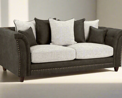 Bella Grey 3 seater sofa. Crafted with a blend of polyester and faux leather. scatter back cushions. removable cushions. stud detail around the frame 