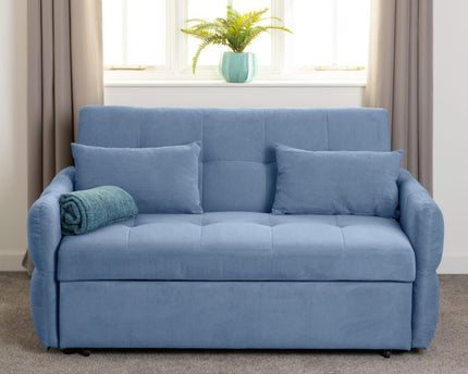 Blue sofa bed with cushions and button detail on the seats