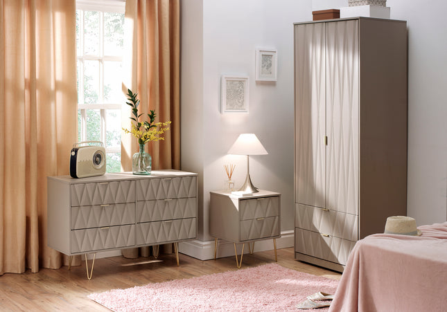 A bedroom set including a mushroom-colored dresser with six drawers, a two-drawer locker, and a wardrobe, all featuring gold metal handles and hairpin legs, 