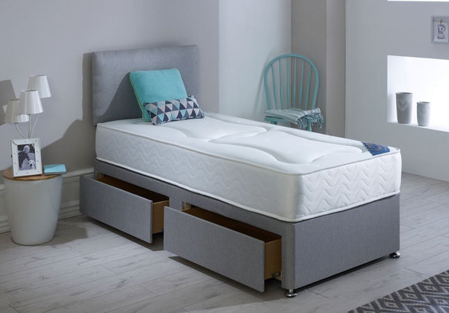 A single divan bed with a gray headboard and base, featuring drawers for storage, upholstered in Linoso Silver fabric.
