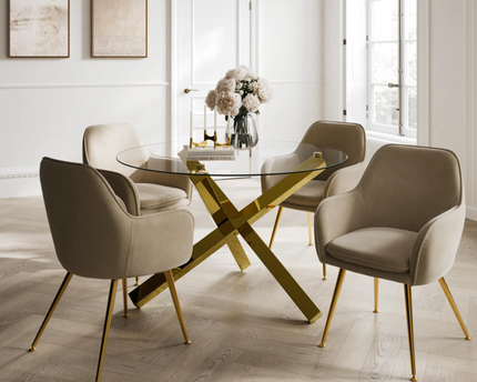 Dining room with a glass table and beige chairs 
