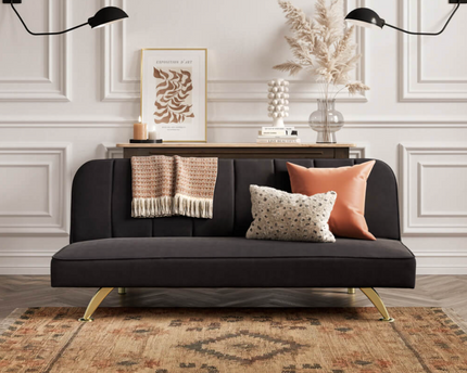 Black sofa bed with stripe stiching detail 
