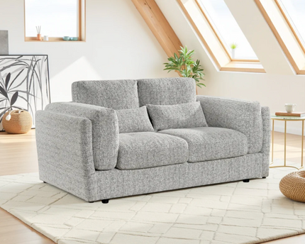 The Bari 3 Seater plush comfort with  soft plump cushions and gentle arm cushions. In grey