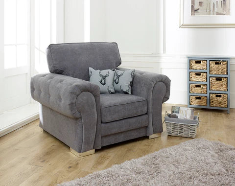 Verona Armchair - Grey foam-filled cushions and soft polyester fabric. button detail on the large square arms