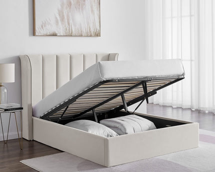 Double ottoman bed with a winged headboard in a natural colour, with storage under the mattress