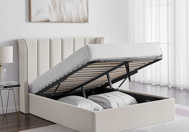 Double ottoman bed with a winged headboard in a natural colour, with storage under the mattress