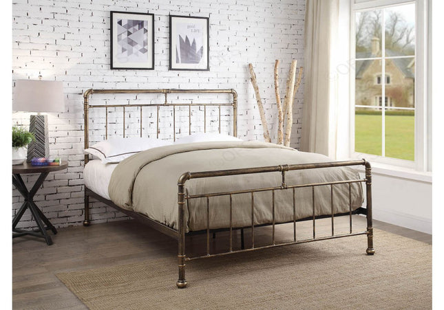 A bronze double bed frame with a metal grid design.