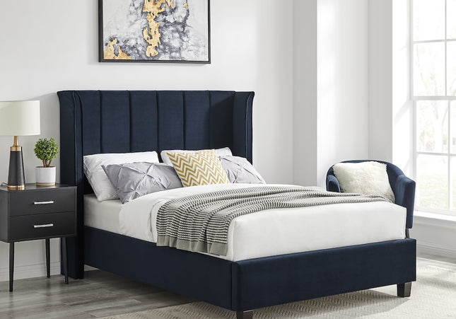 A navy winged headboard  bed upholstered in velvet, 