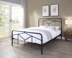 A double bed frame with a black steel frame and a white mattress, 
