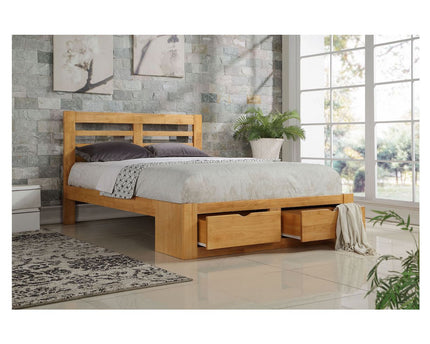 Double oak bed frame with a solid paneled headboard and 2 wooden drawers at the end of the bed 