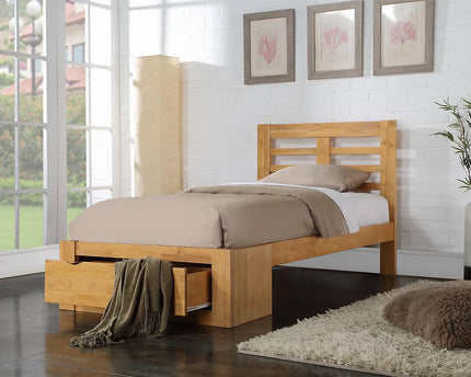 A double oak bed frame with a a large woden draw at the end of the bed 