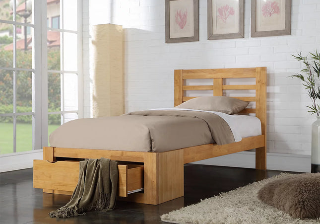 A double oak bed frame with a a large woden draw at the end of the bed 