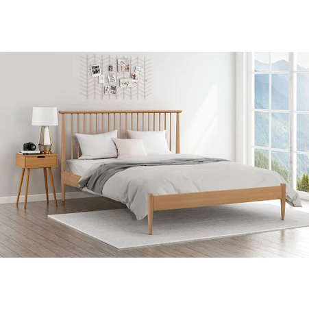 A double bed with a Pine wooden frame, a white mattress,